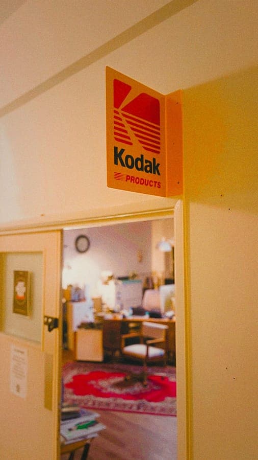 The doorway into the lab, with a vintage Kodak sign above it